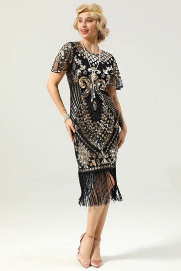 Vestido preto e dourado de 1920 com mangas de batwing
